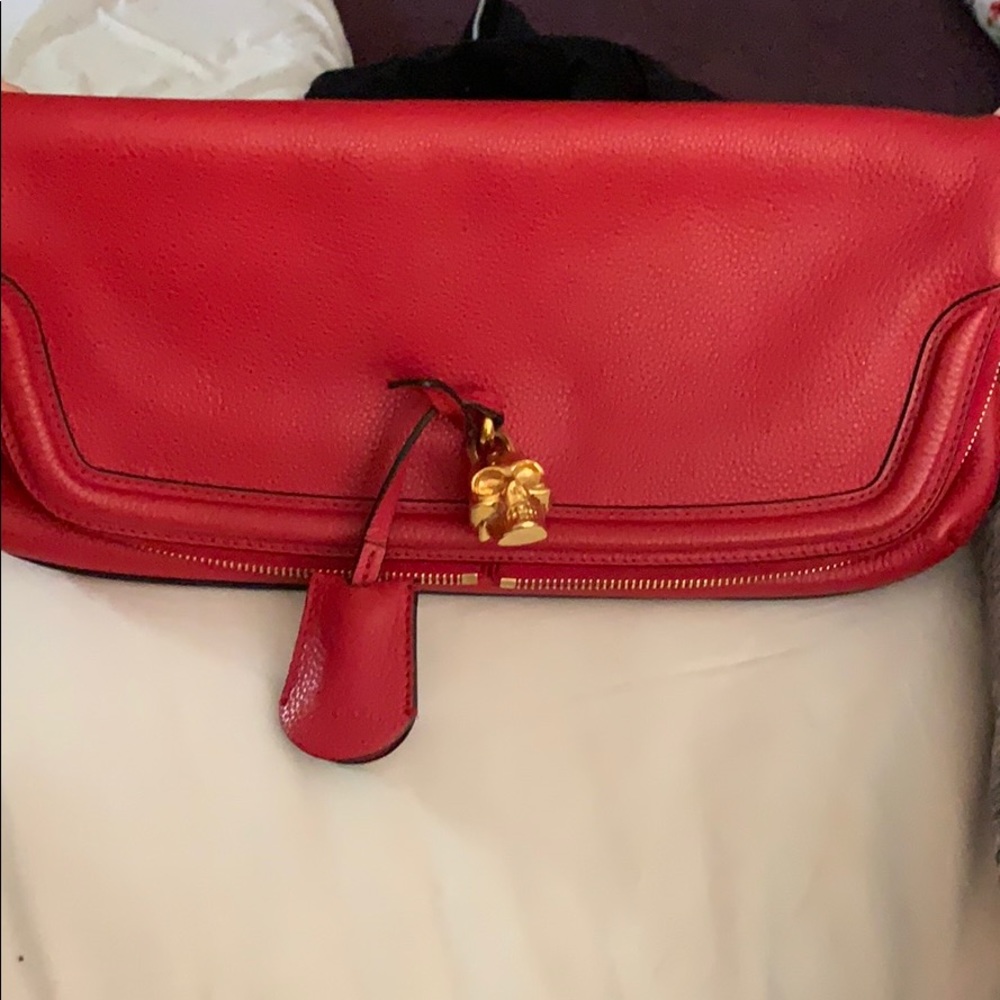 Alexander McQueen skull padlock leather clutch